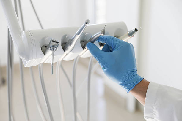 Professional Tooth Extraction technician working in Portland, OR